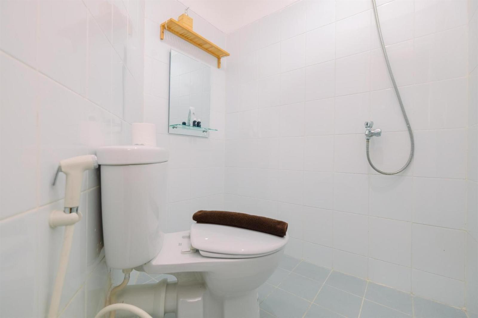 Homey 1br Without Living At Gunung Putri Square By Travelio