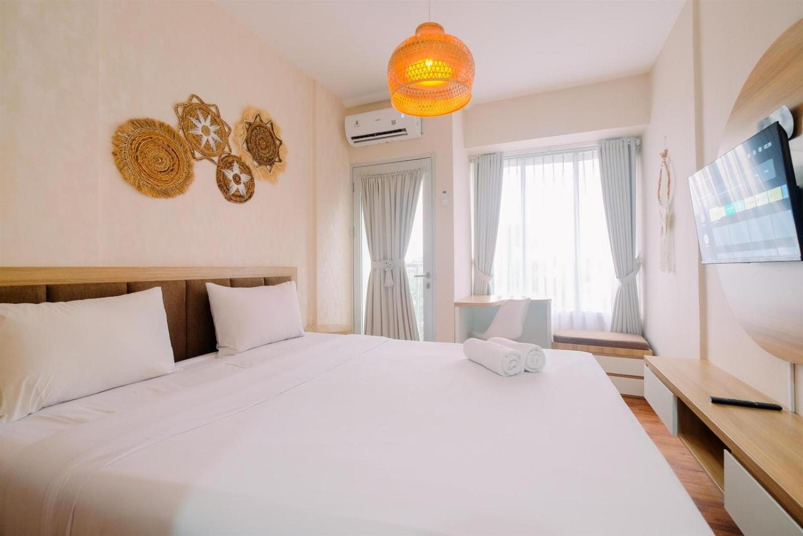 Apartemen Homey 1br Without Living At Gunung Putri Square By Travelio *